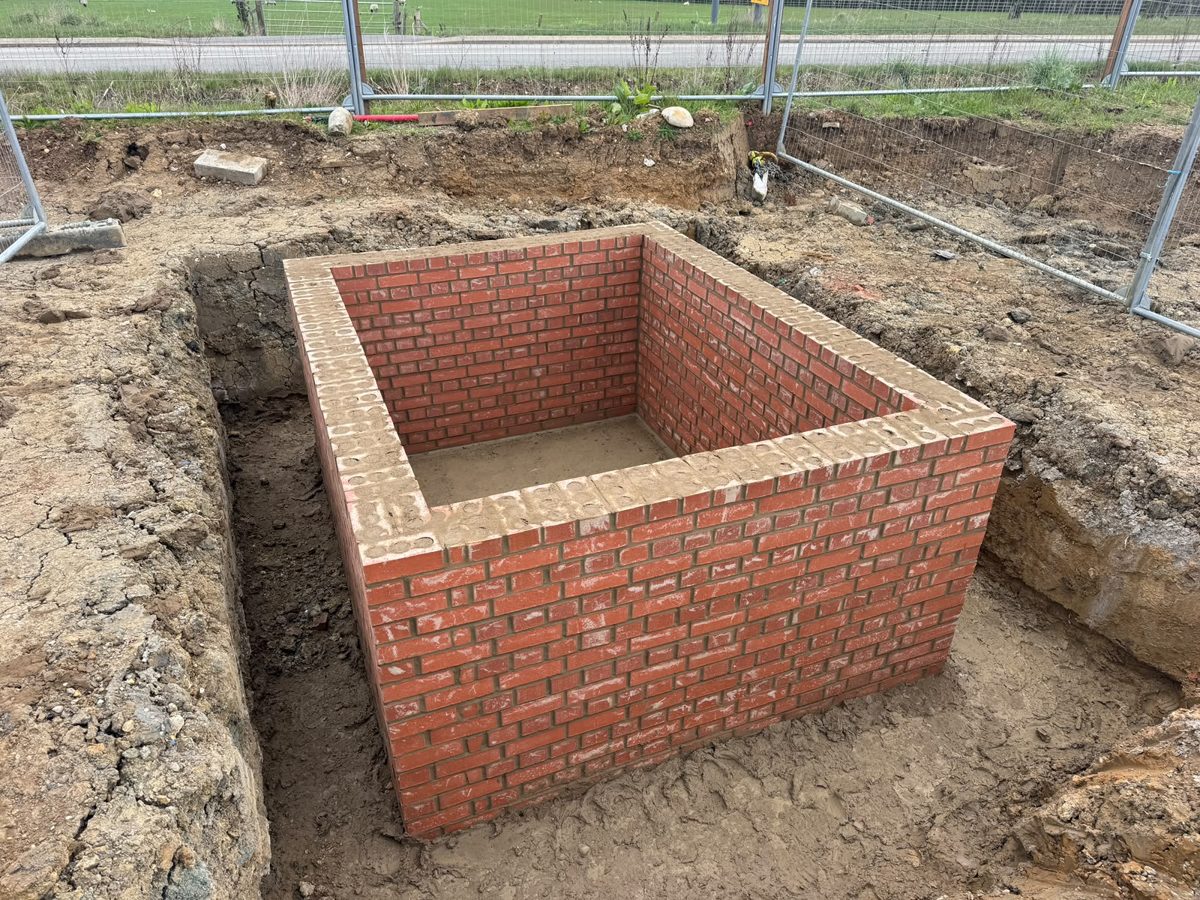 Brick outbuilding base built off new footings